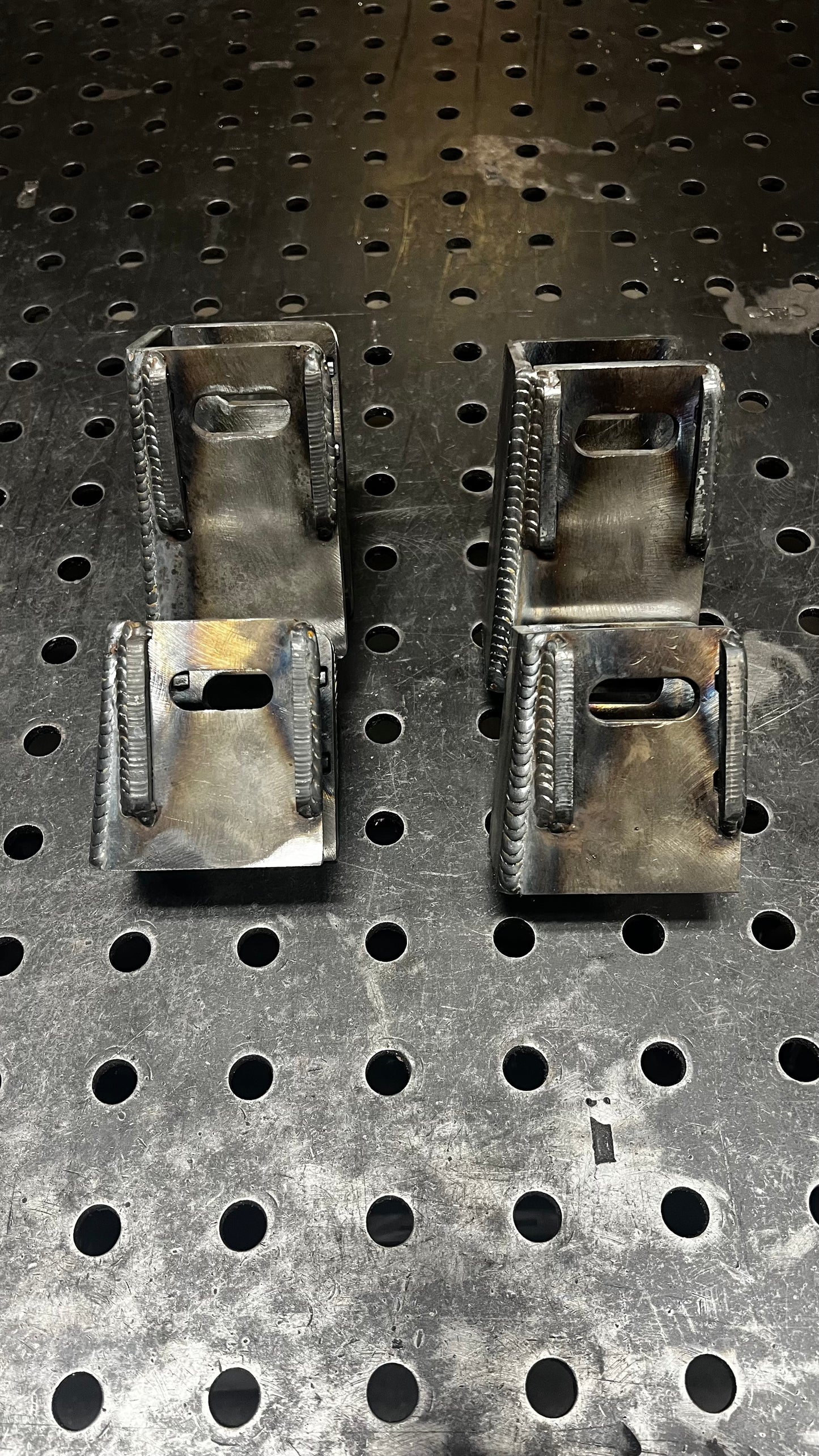 Raised control arm tabs