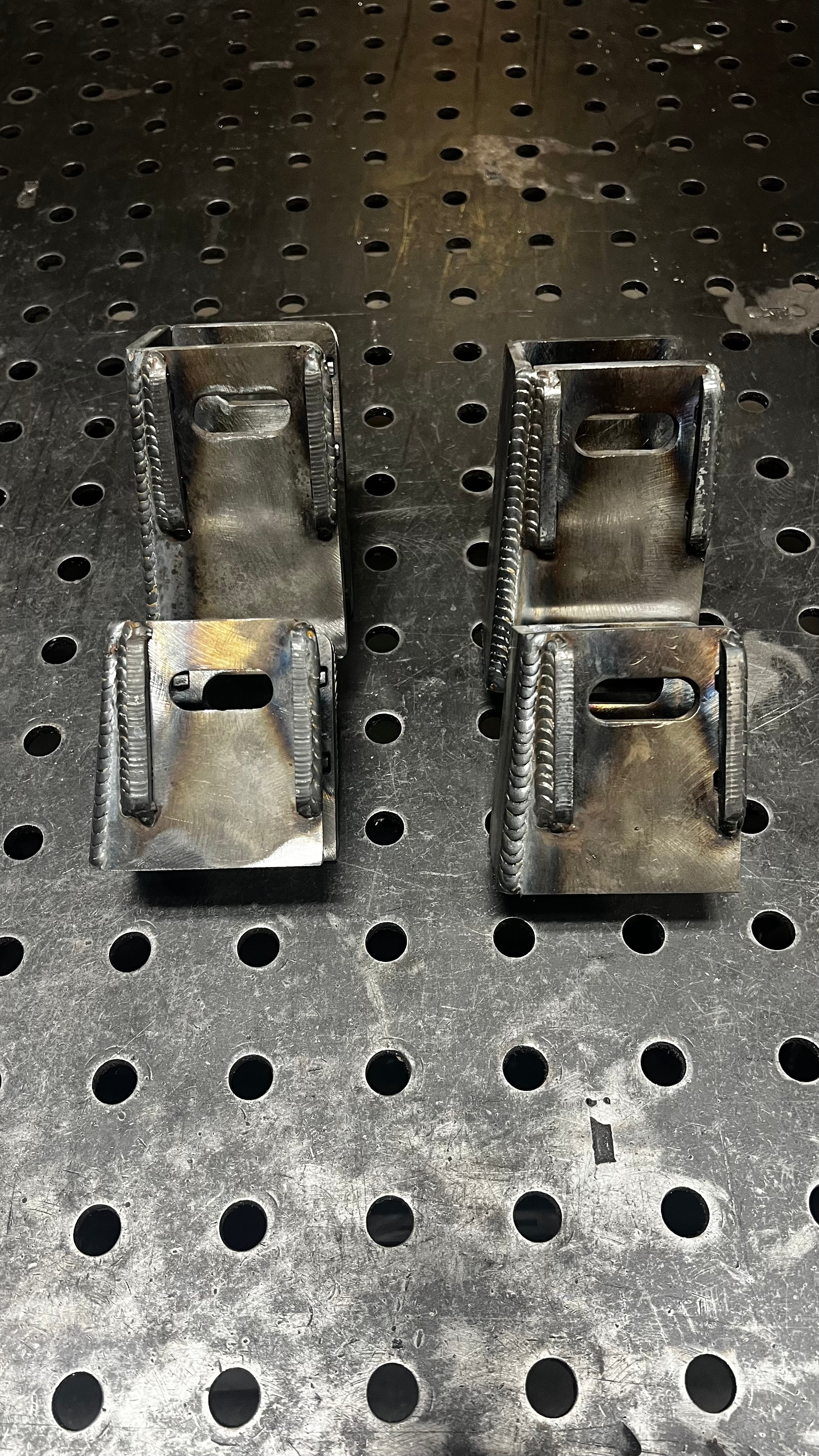 Raised control arm tabs – DC Fab